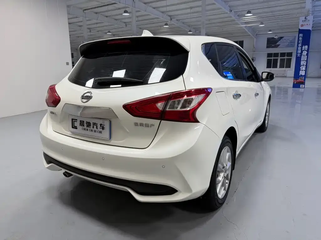 Nissan Tiida — фото 4