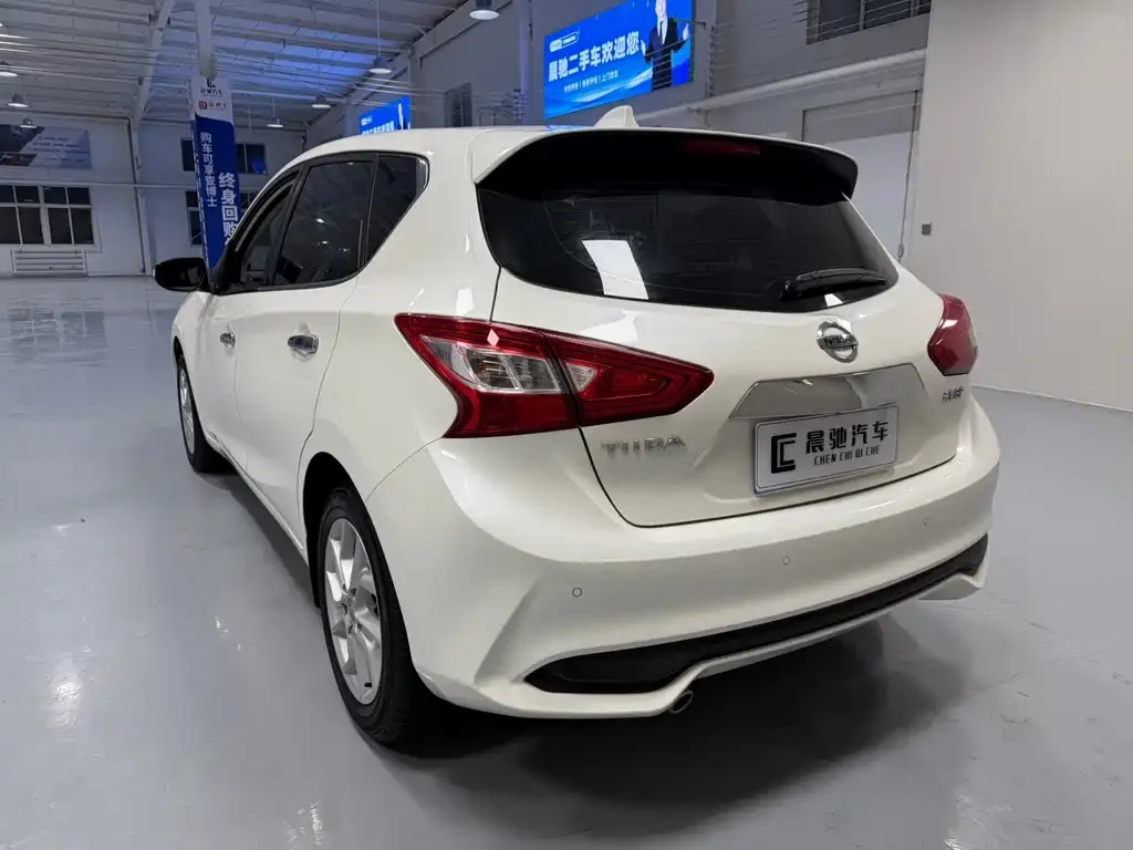 Nissan Tiida — фото 8