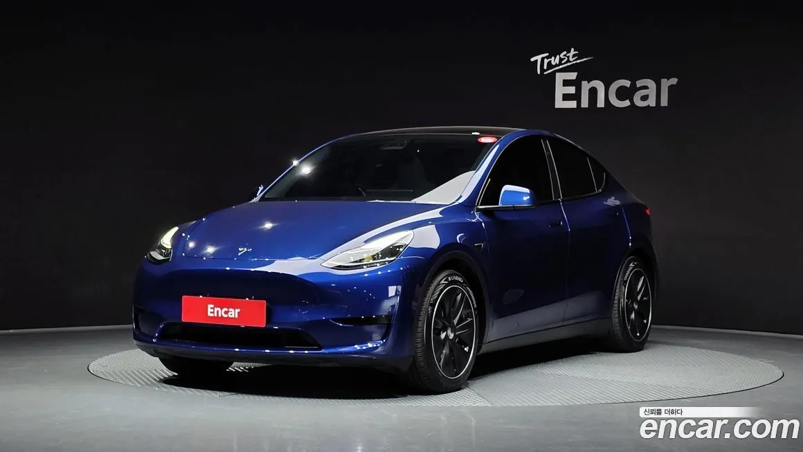 Tesla Model Y — фото 1