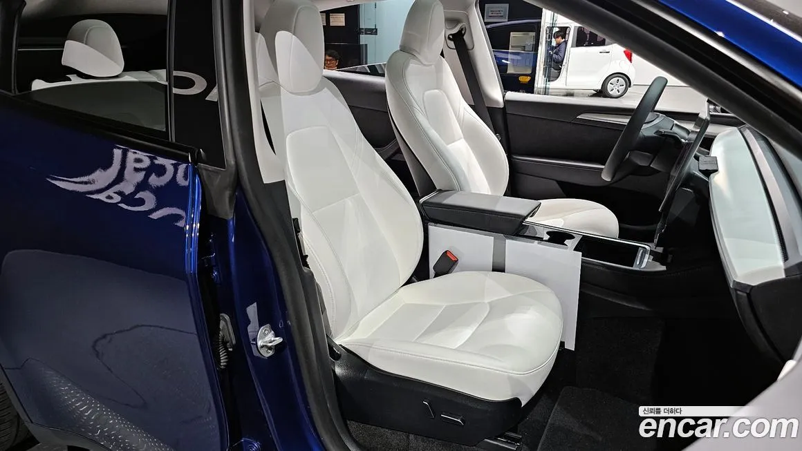 Tesla Model Y — фото 8
