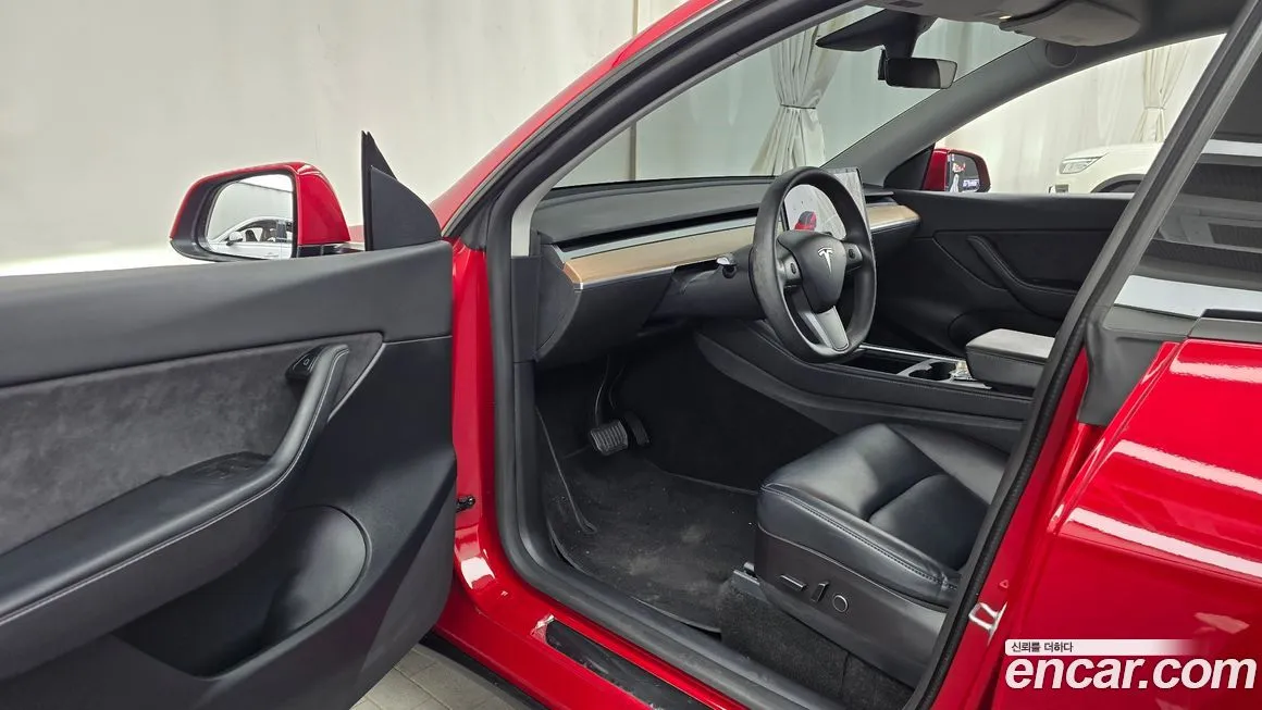 Tesla Model Y — фото 10