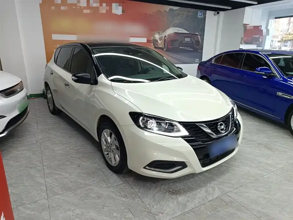 Nissan Tiida — фото 4