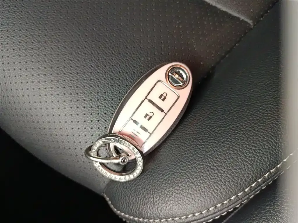 Nissan Tiida — фото 9