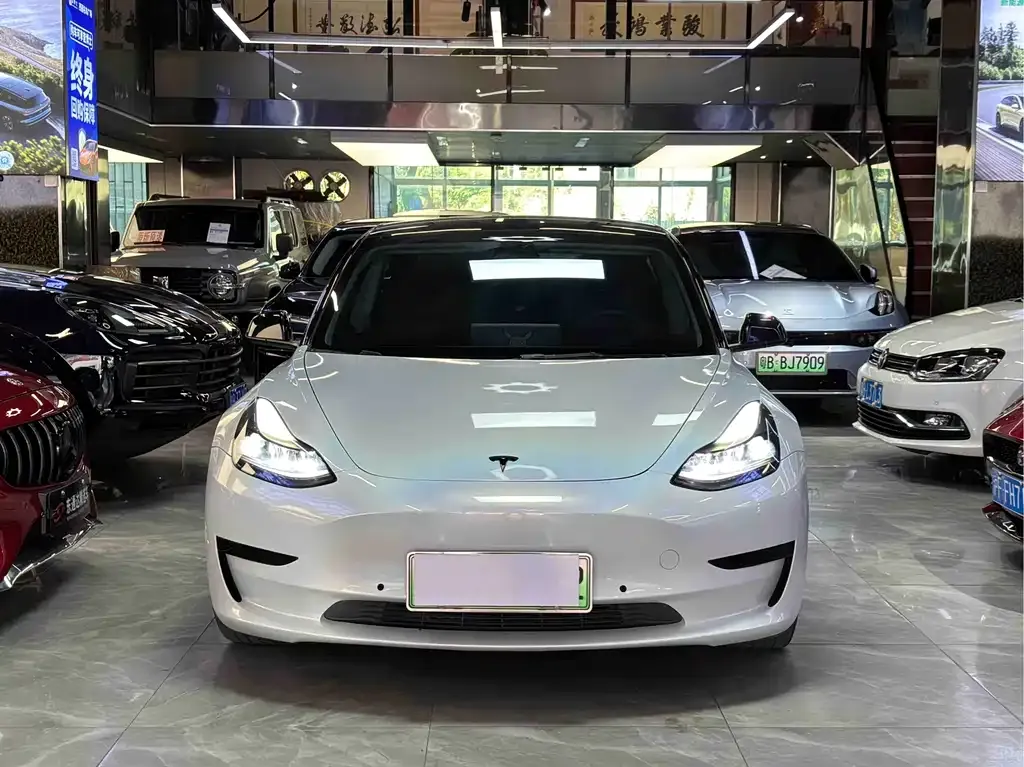 Tesla Model 3 — фото 10