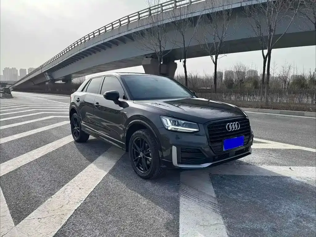 Audi Q2L — фото 6