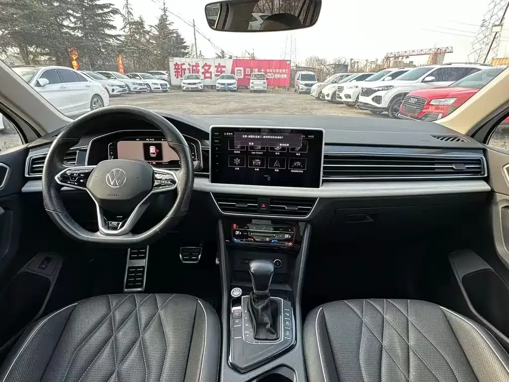 Volkswagen Tiguan L — фото 2