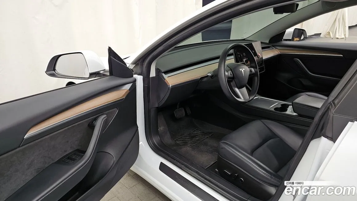 Tesla Model 3 — фото 10