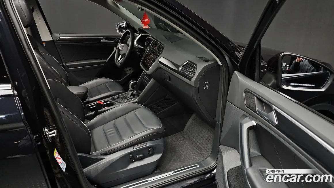 Volkswagen Tiguan — фото 10
