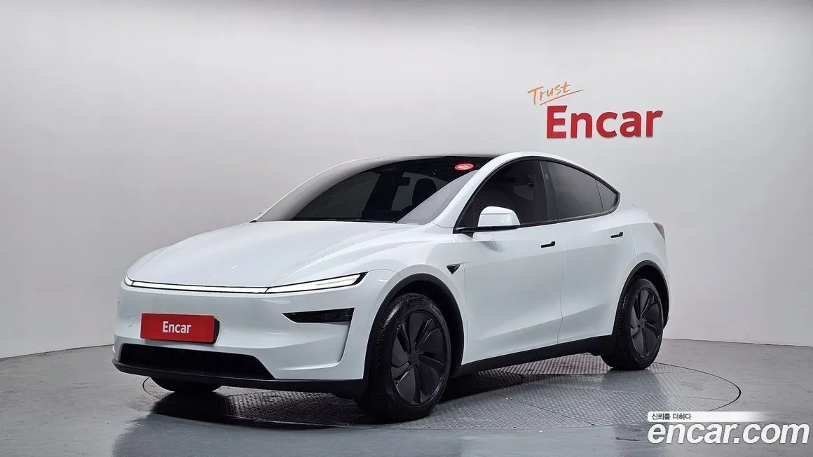 Tesla Model Y — фото 1