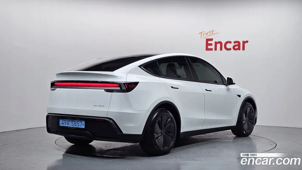 Tesla Model Y — фото 2