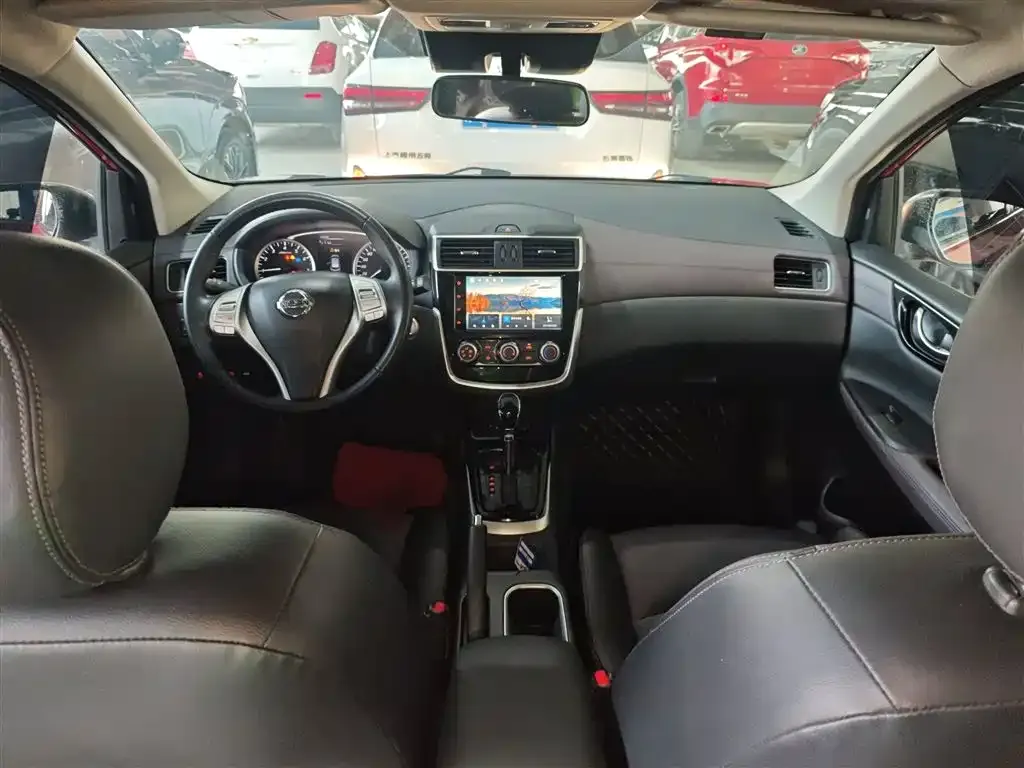 Nissan Tiida — фото 10