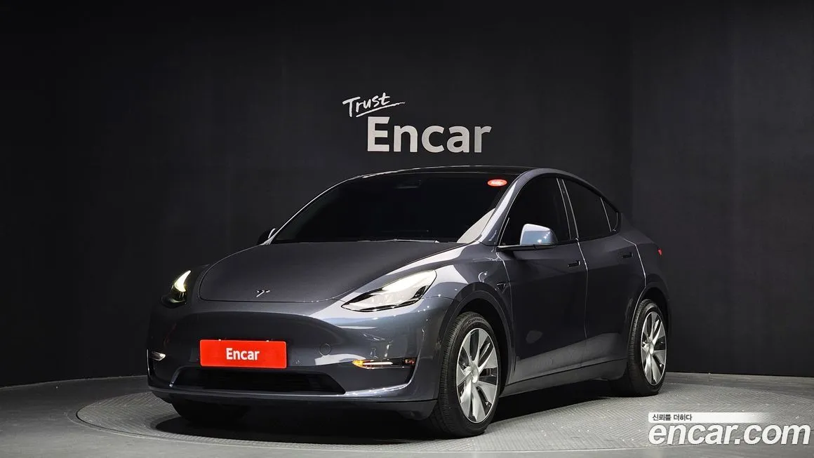 Tesla Model Y — фото 1