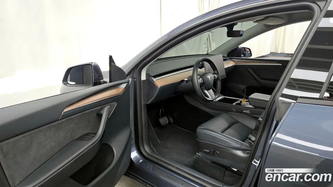 Tesla Model Y — фото 7