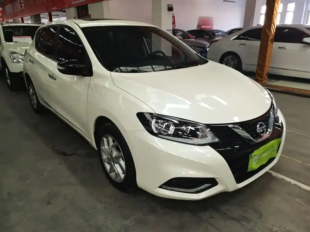 Nissan Tiida — фото 10