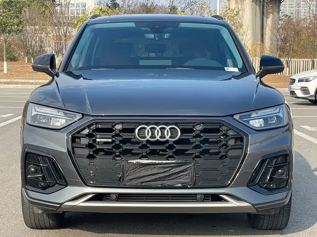 Audi Q5L — фото 8