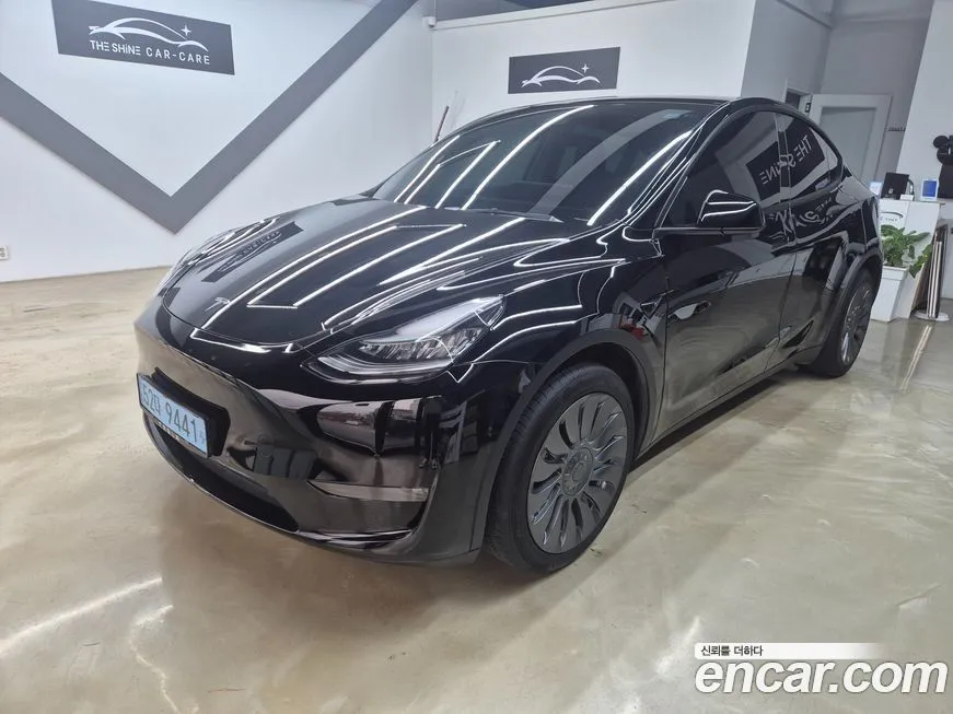 Tesla Model Y — фото 1