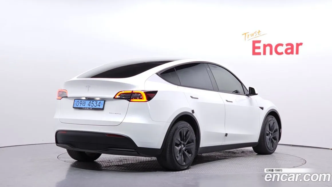 Tesla Model Y — фото 2