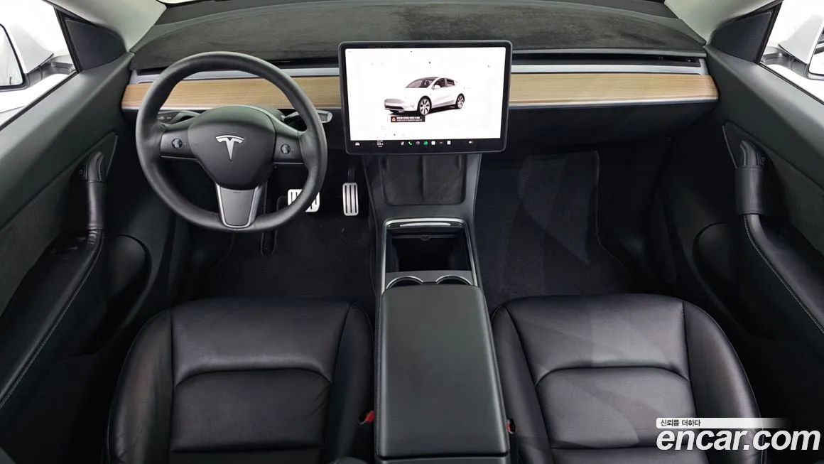 Tesla Model Y — фото 7