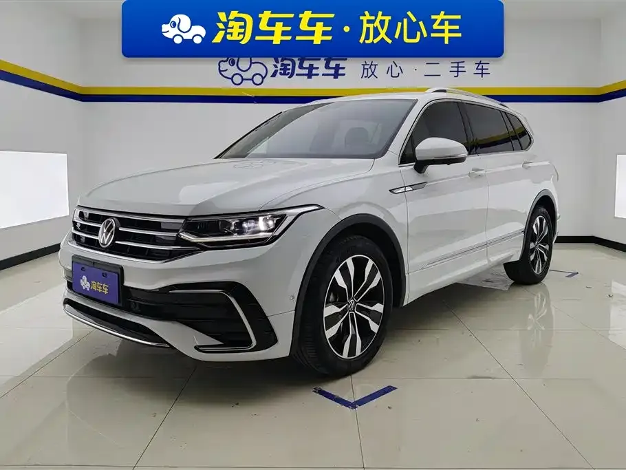 Volkswagen Tiguan L — фото 1