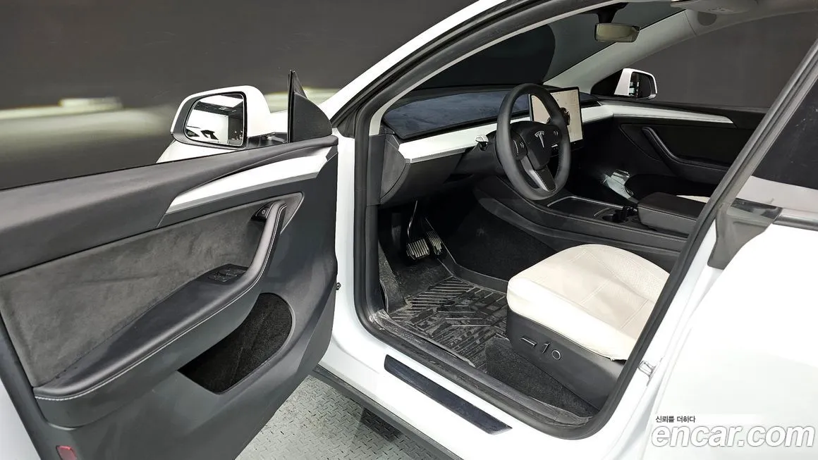 Tesla Model Y — фото 6