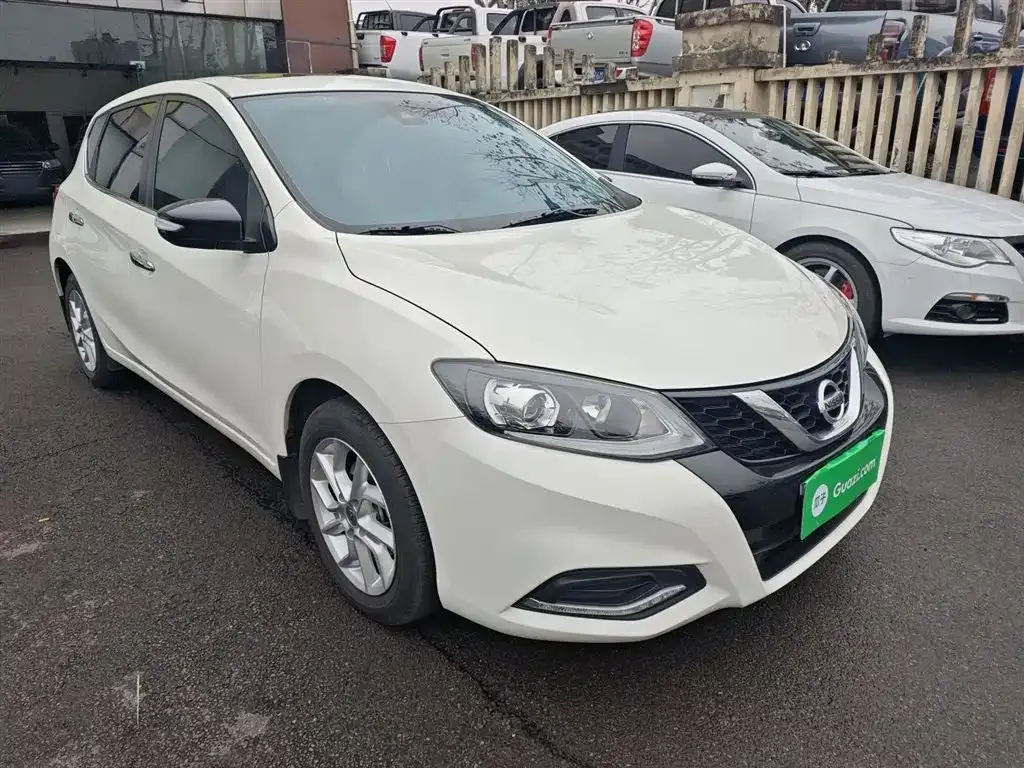 Nissan Tiida — фото 9