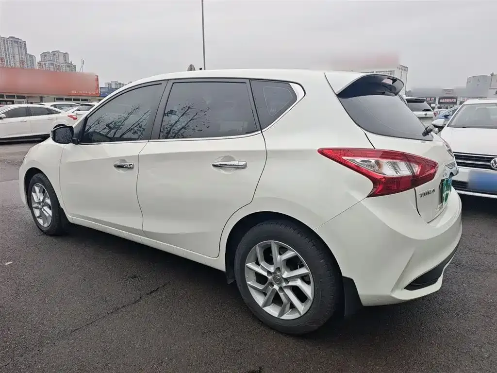 Nissan Tiida — фото 10