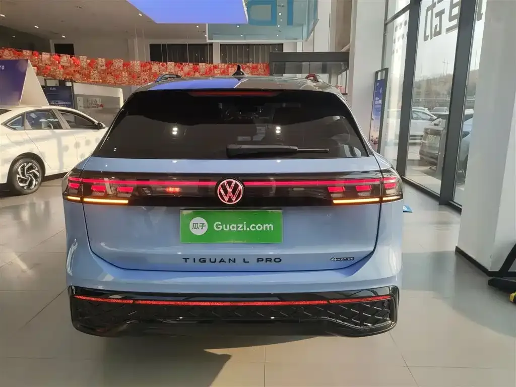 Volkswagen Tiguan L — фото 3