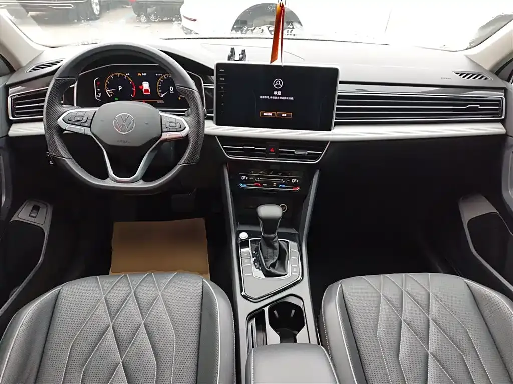 Volkswagen Tiguan L — фото 9