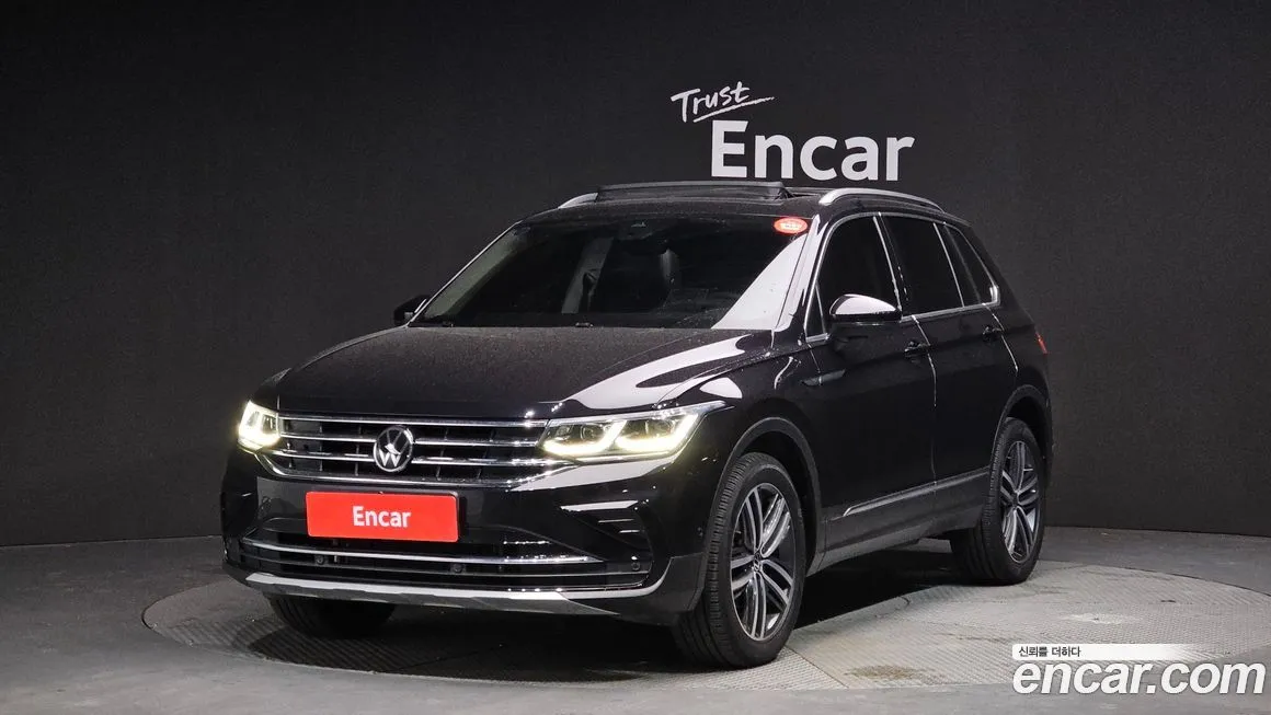 Volkswagen Tiguan — фото 1