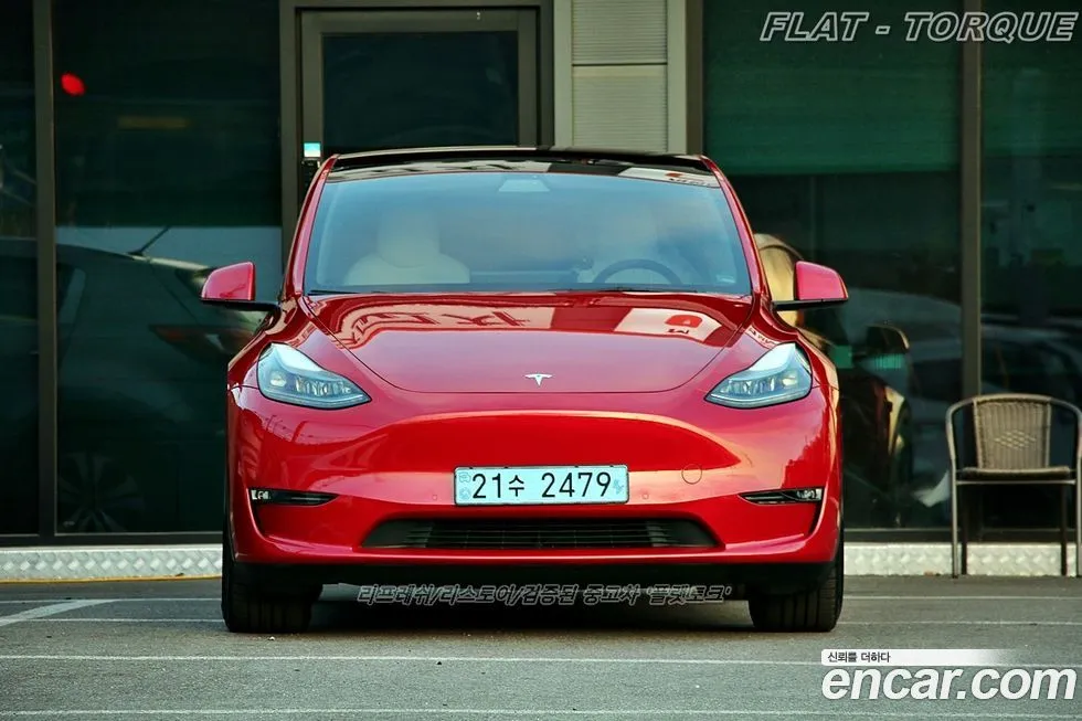 Tesla Model Y — фото 9