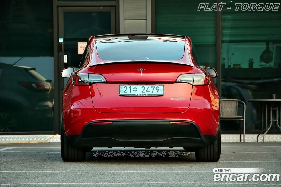 Tesla Model Y — фото 5