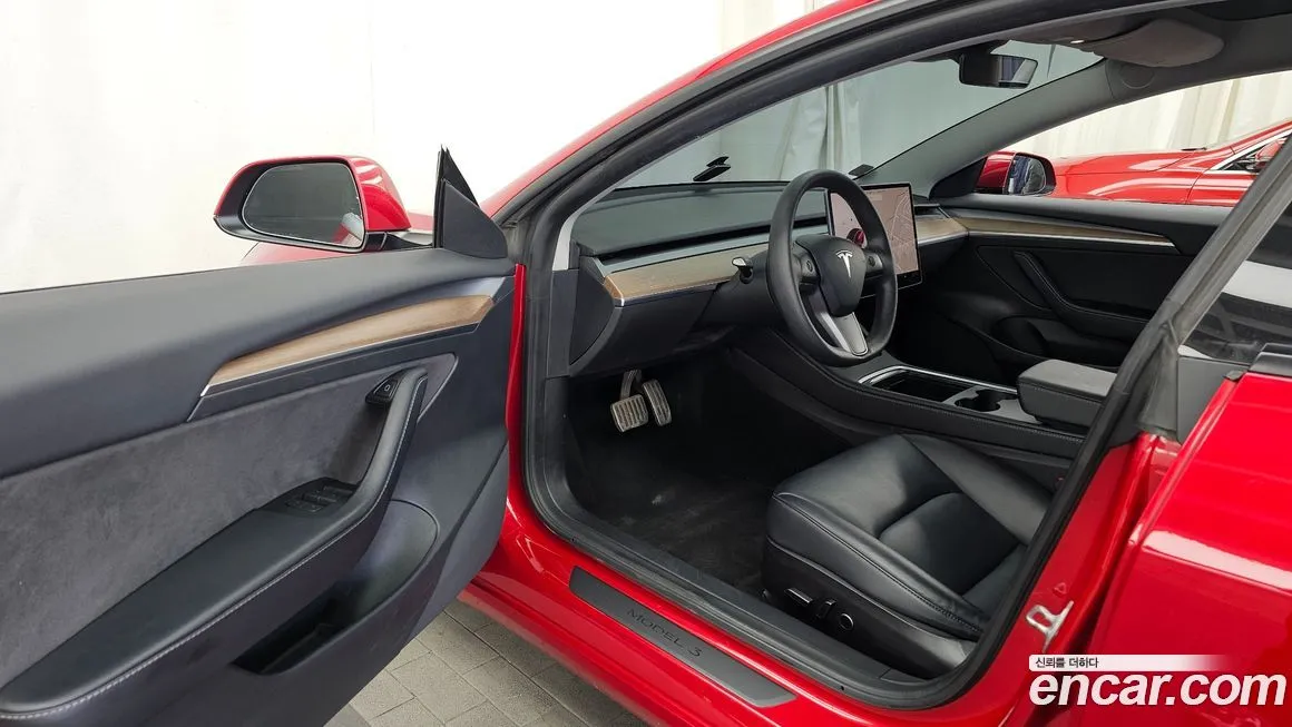Tesla Model 3 — фото 10