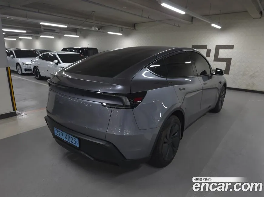 Tesla Model Y — фото 7