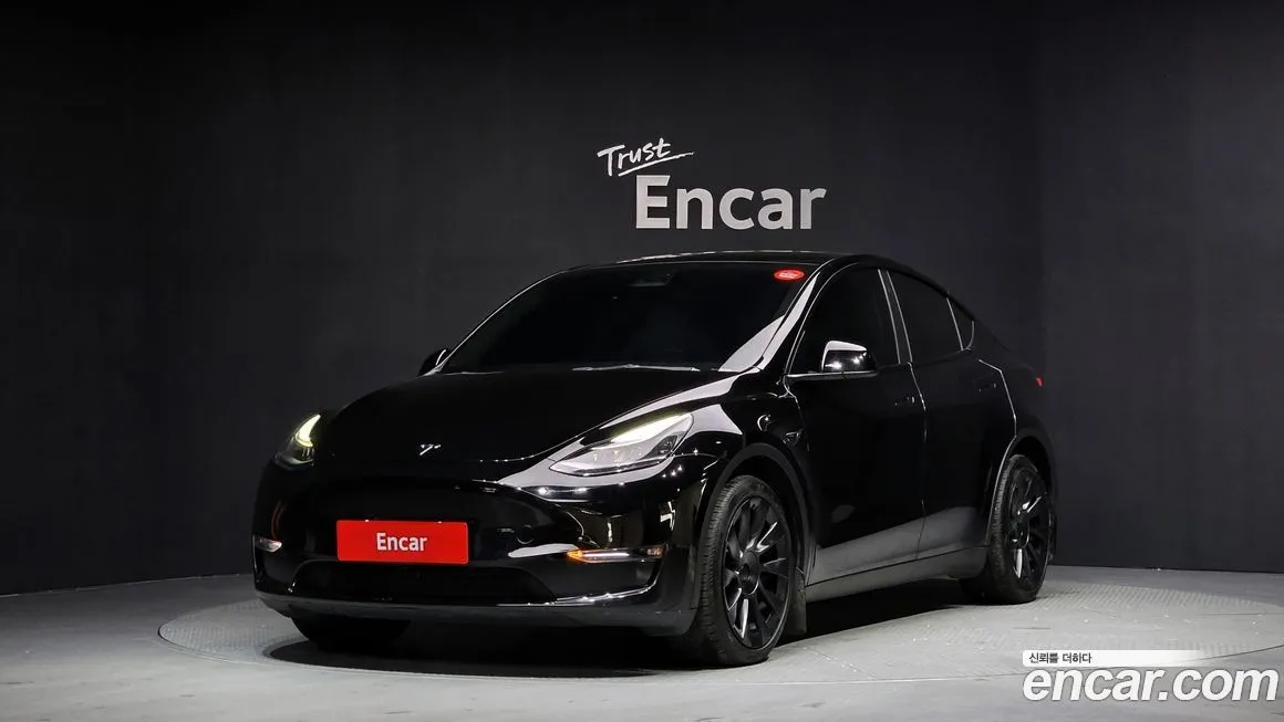 Tesla Model Y — фото 1