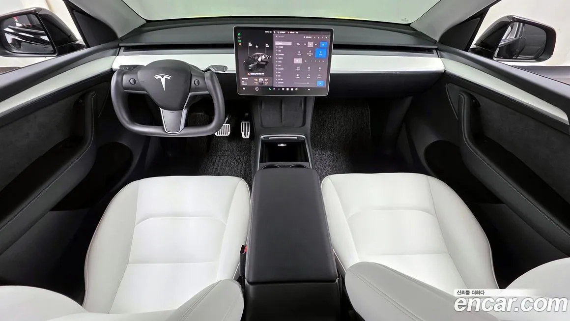 Tesla Model Y — фото 8