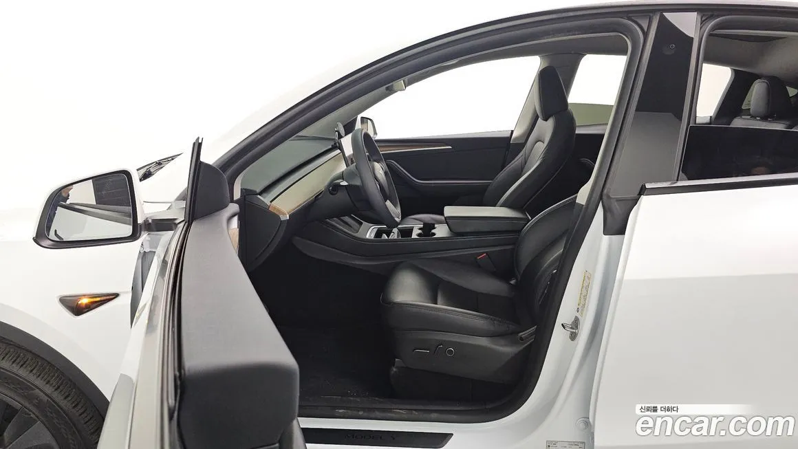 Tesla Model Y — фото 9