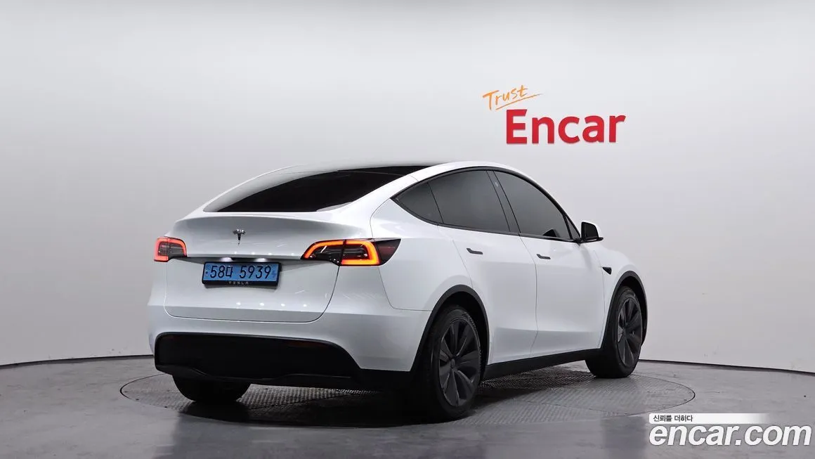 Tesla Model Y — фото 7