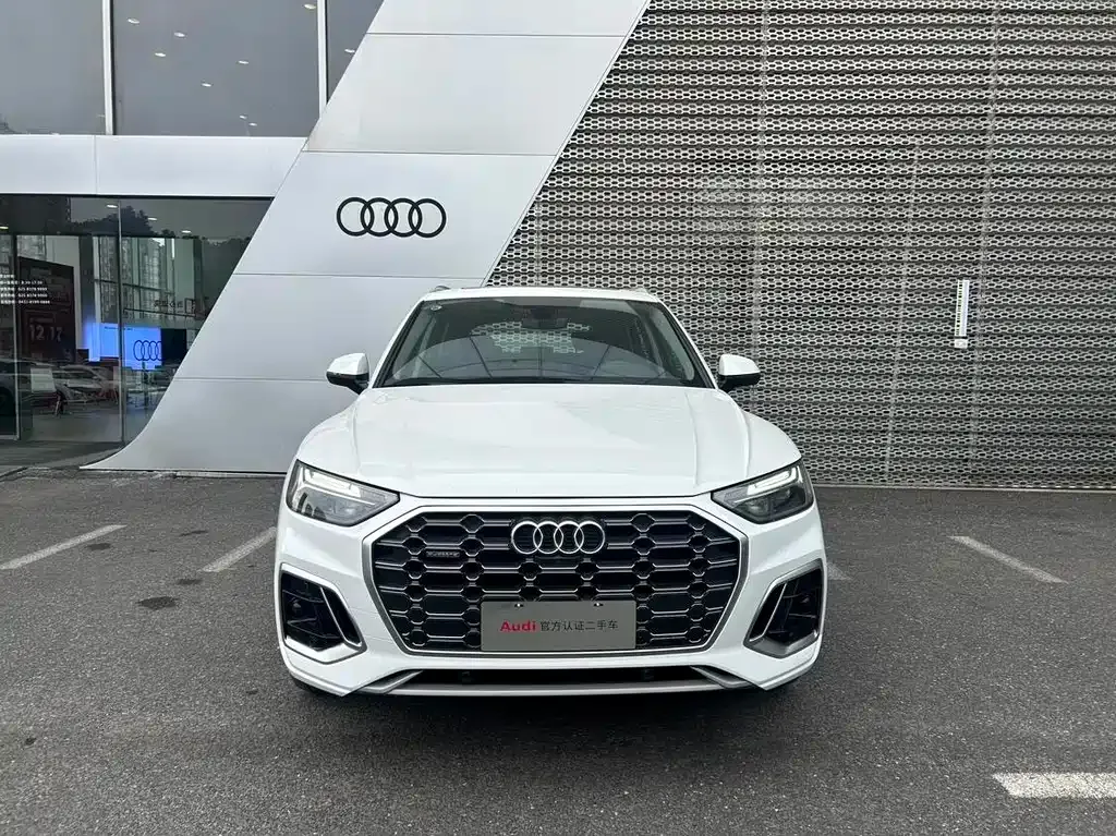 Audi Q5L — фото 10