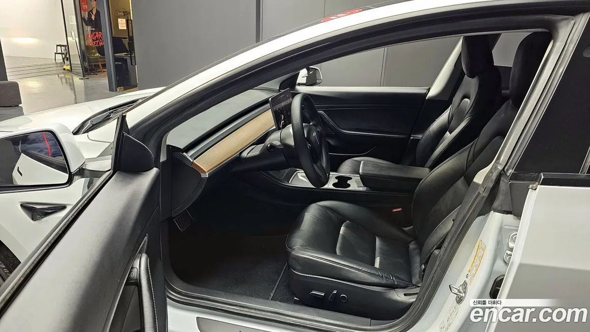 Tesla Model 3 — фото 6