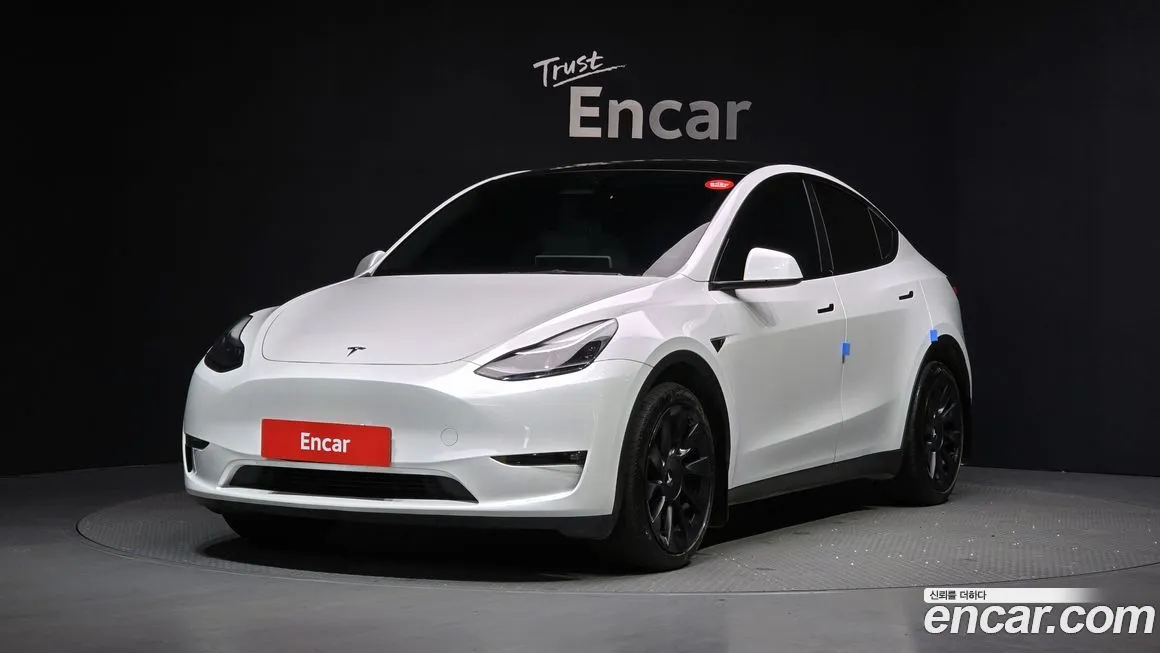 Tesla Model Y — фото 1