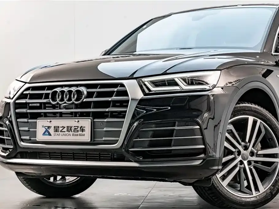 Audi Q5L — фото 6