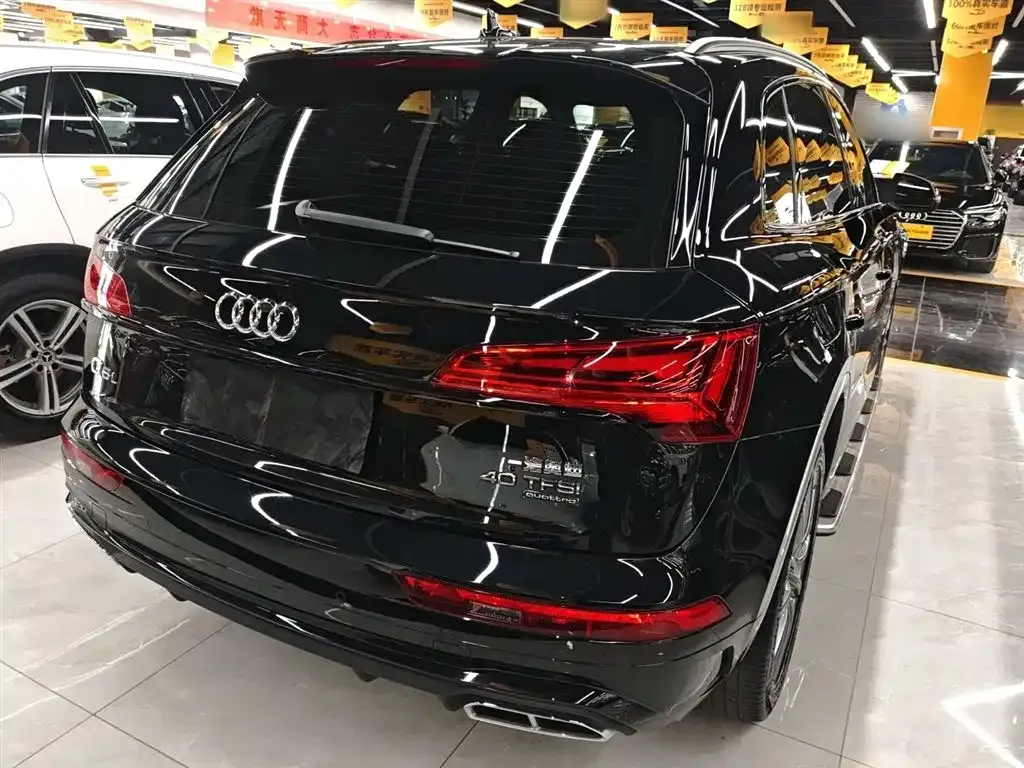 Audi Q5L — фото 10
