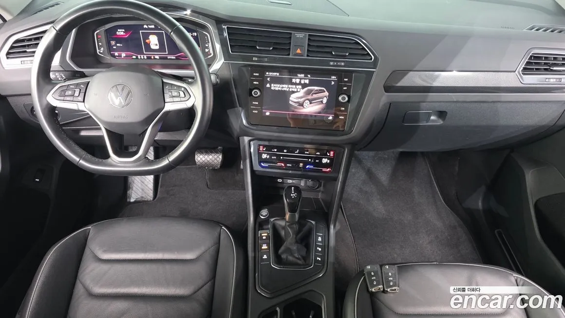 Volkswagen Tiguan — фото 10