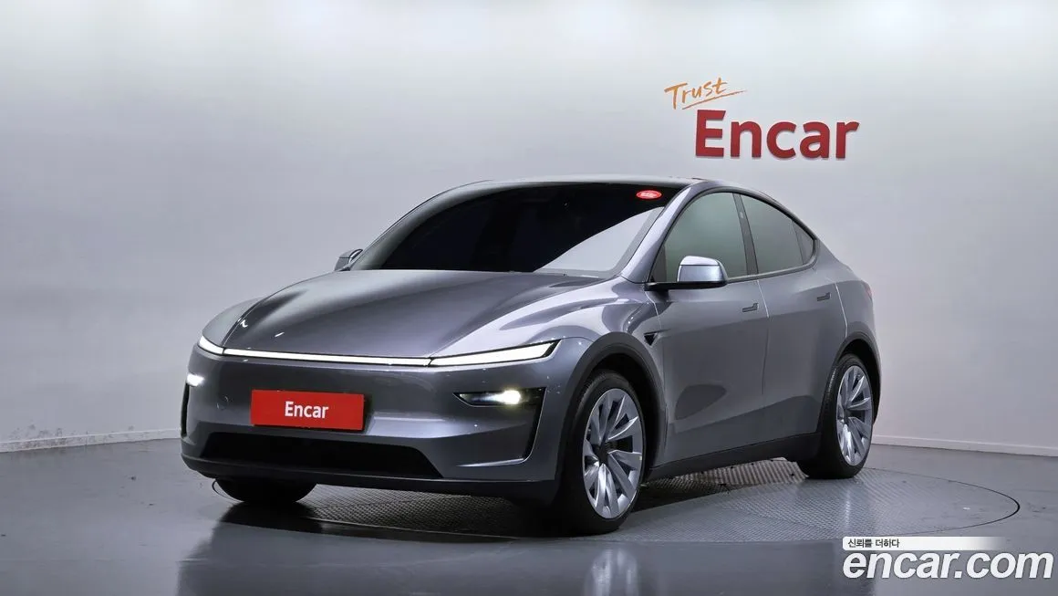 Tesla Model Y — фото 1