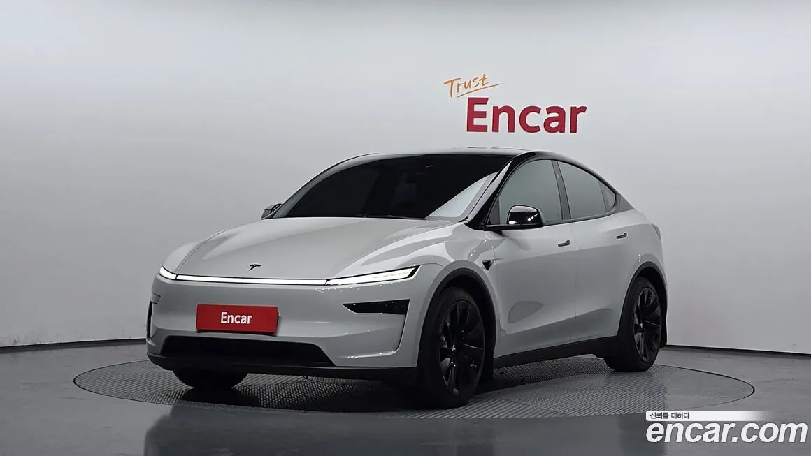 Tesla Model Y — фото 1