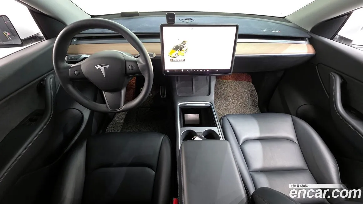 Tesla Model Y — фото 7