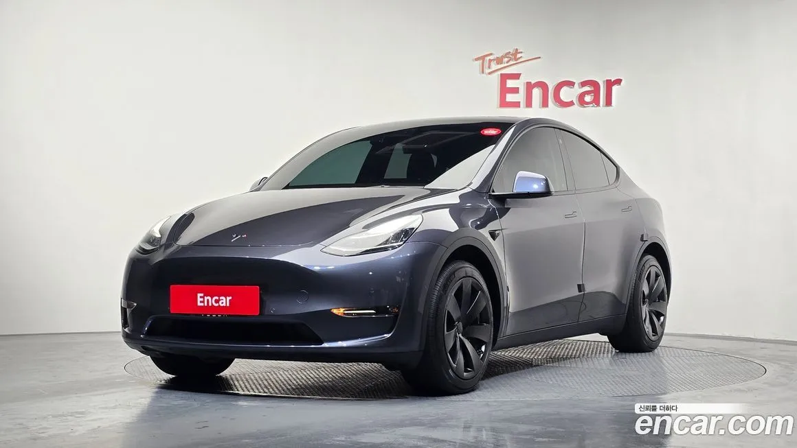 Tesla Model Y — фото 1