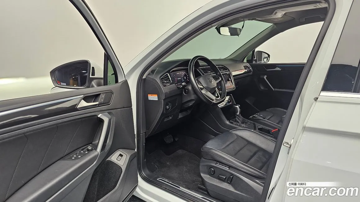 Volkswagen Tiguan — фото 10