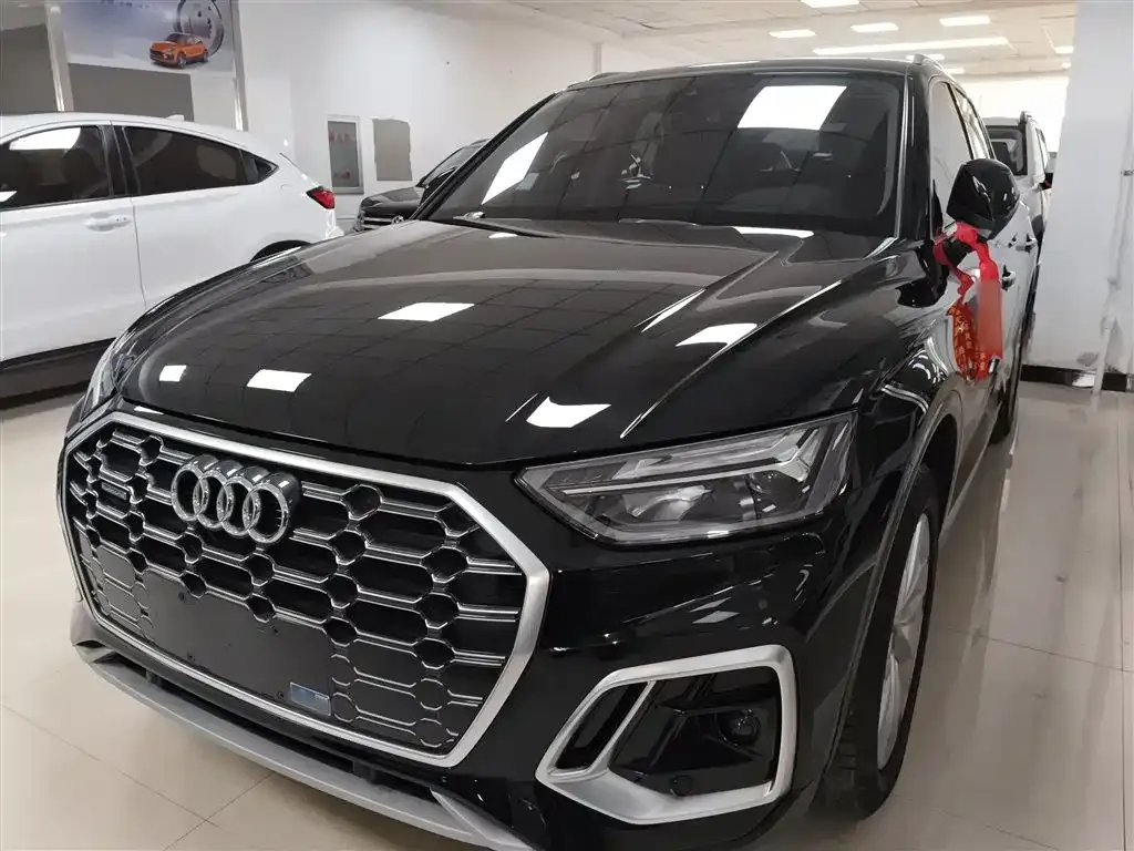 Audi Q5L — фото 10