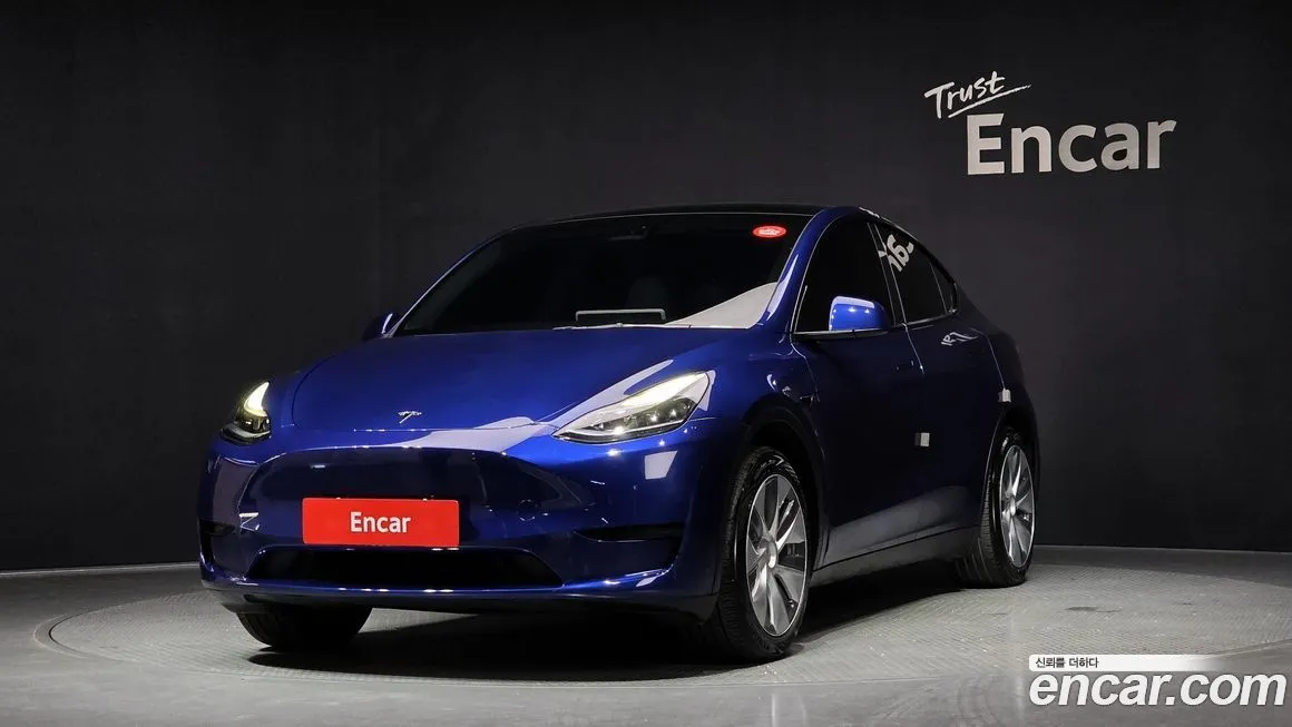 Tesla Model Y — фото 1